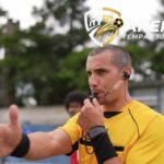 Referee whistling to start or ending soccer match