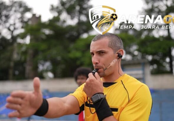 Referee whistling to start or ending soccer match