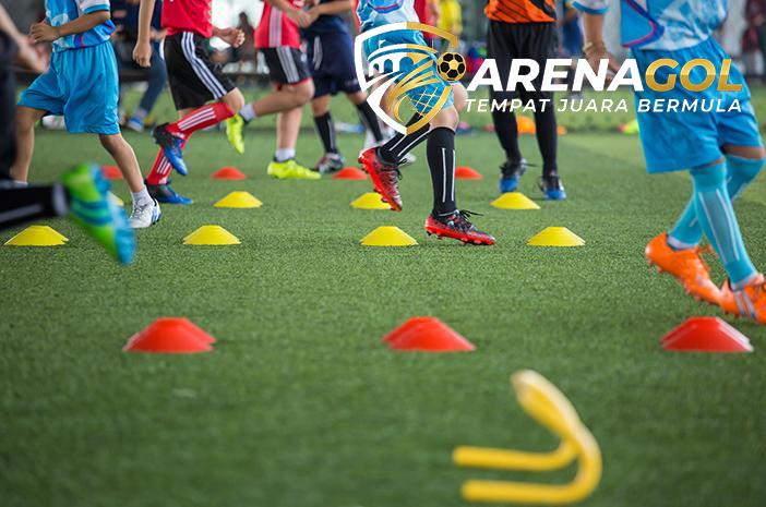Soccer,Ball,Tactics,On,Grass,Field,With,Cone,For,Training